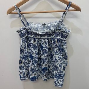 Super cute blue white and light yellow flowy tank top!